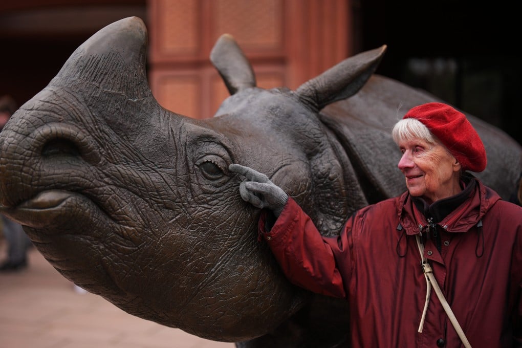 Monika Jansen, 85, touches a sculpture of a rhino as she takes part in a guided tour for people with dementia organised by Malteser Berlin, part of the international Catholic aid organisation The Sovereign Order of Malta, at Berlin Zoo in Germany on March 26, 2026. Photo: AP