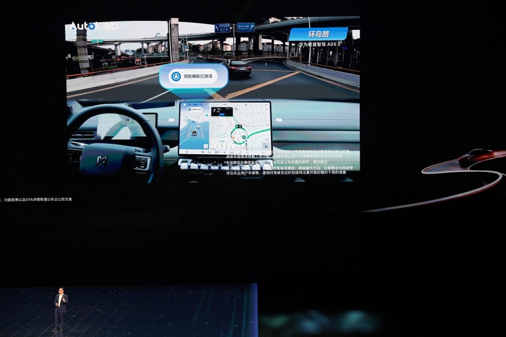 Richard Jin, CEO of Huawei’s intelligent automotive solutions business unit, introduces the company’s latest advanced driving system in Beijing on April 23, 2026. Photo: Reuters