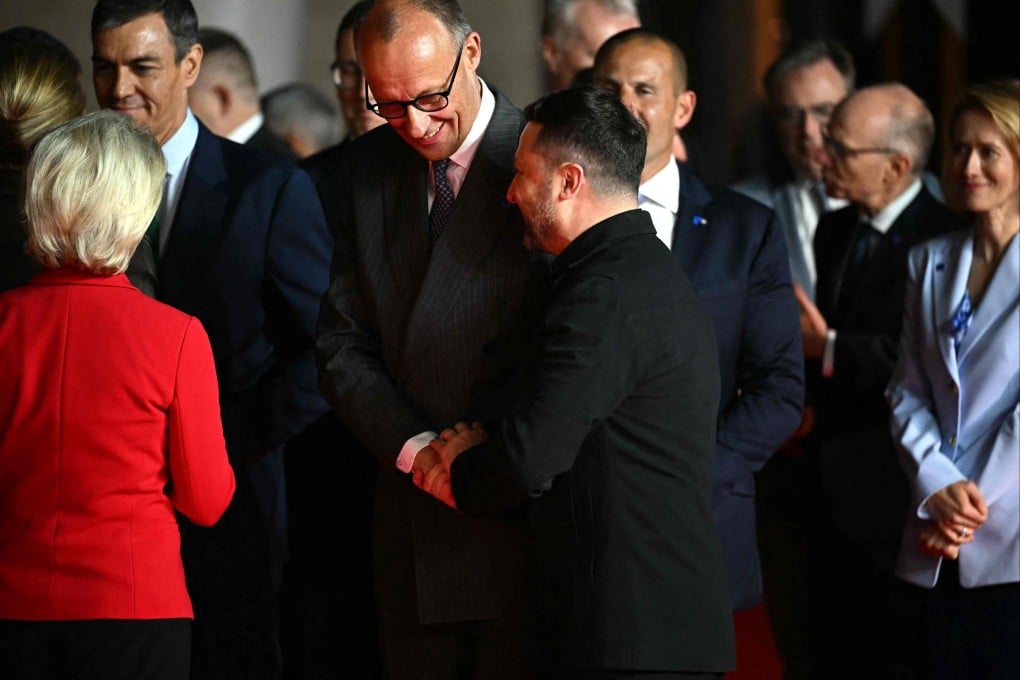 Germany’s Chancellor Friedrich Merz (middle) shakes hands with Ukraine’s President Volodymyr Zelensky ahead of an informal meeting of the European Council, in Ayia Napa on Thursday. Photo: AFP