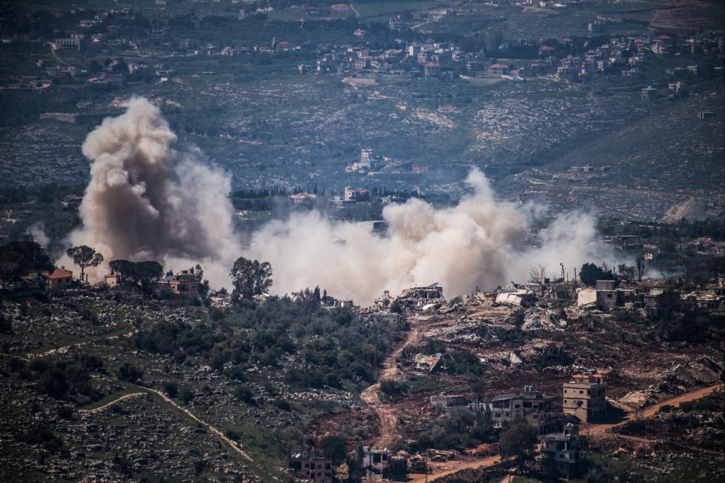 Smoke rises from a village amid Israeli army operations in southern Lebanon on Thursday. Photo: Reuters