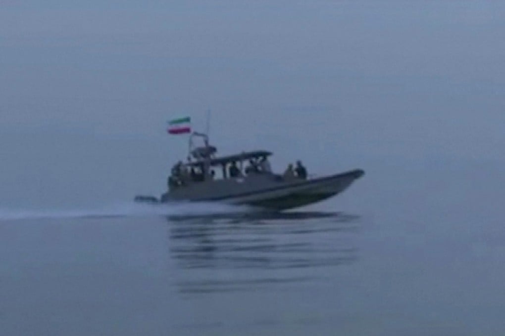 An Islamic Revolutionary Guard Corps fast-attack craft taking part in the seizure of a cargo vessel in the Strait of Hormuz this week. Photo: IRIB TV via AFP