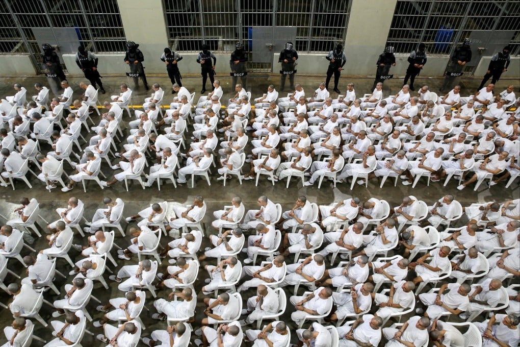 Alleged gang members during their mass trial at El Salvador’s CECOT. Photo: Reuters