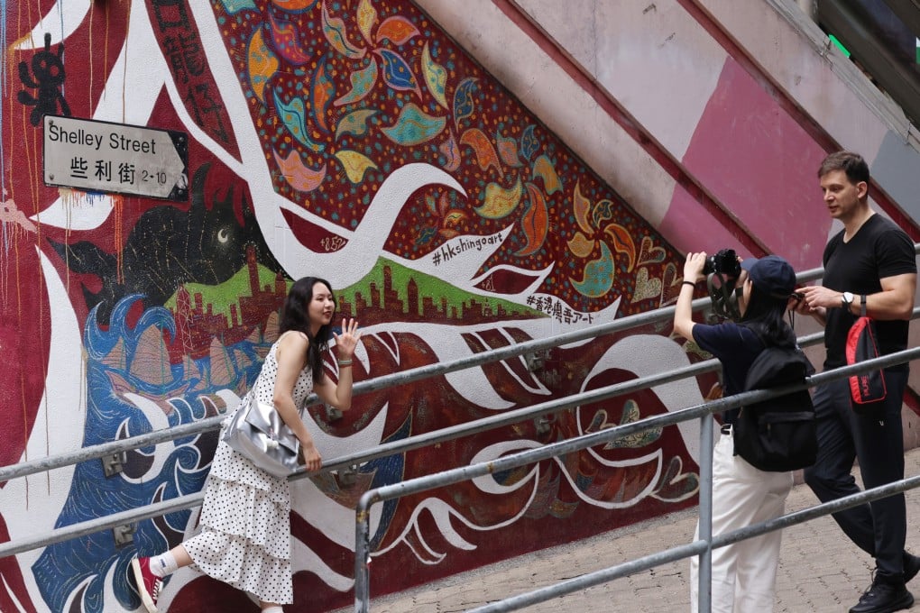 Visitors in Central. The initiative is aimed at encouraging tourists to explore the art, historical sites, local culture and delicacies of Central and Sheung Wan. Photo: Jelly Tse