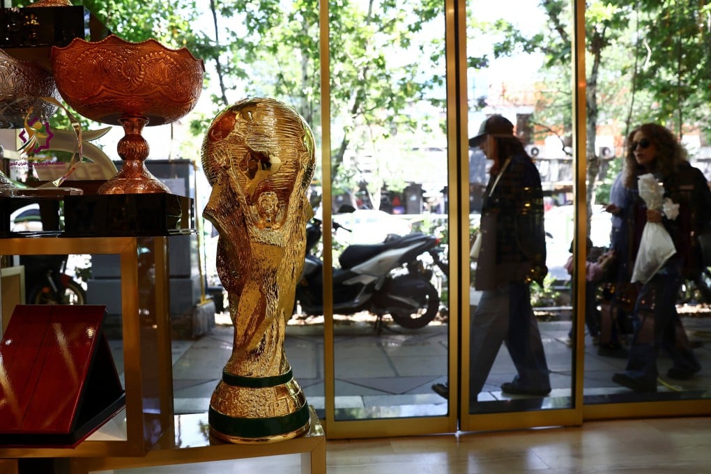 A replica of the Fifa World Cup trophy displayed in a shop in Tehran, Iran on Thursday. Photo: Reuters