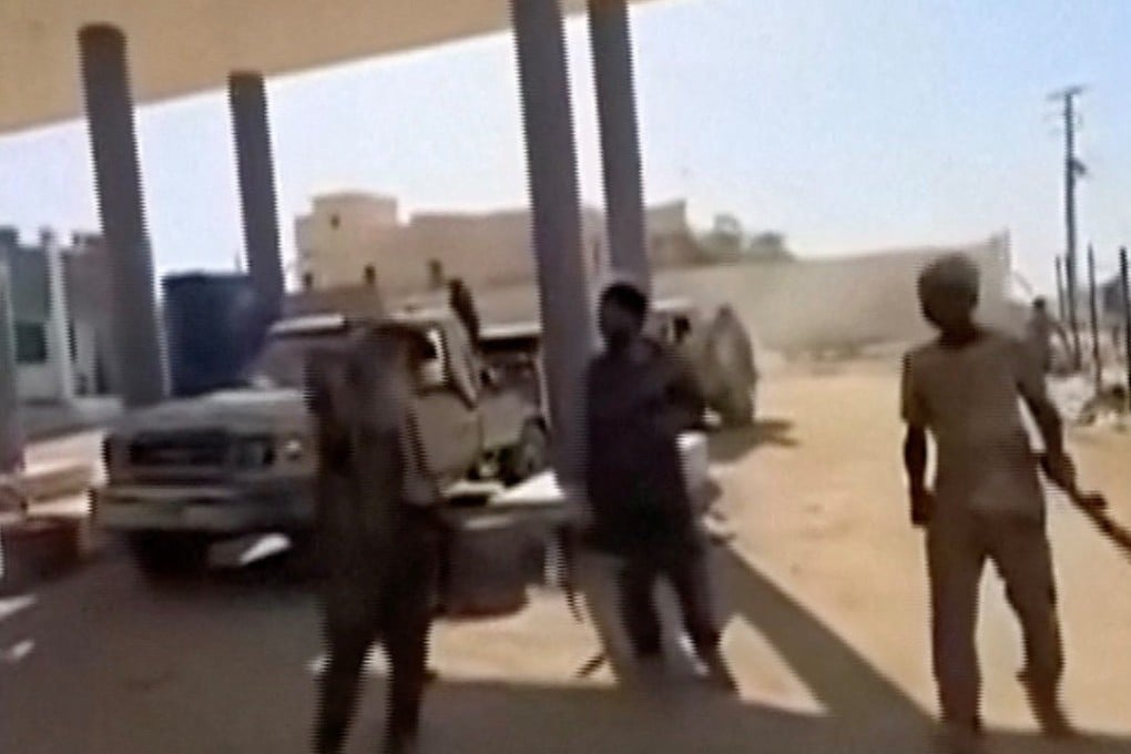 Armed members of an unidentified group gather in Kidal, Mali, in this screen grab obtained from social media released on Saturday. Photo: Mohamed Elmaouloud Ramadane via Reuters