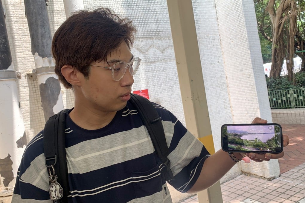 Ian Chu, who took the chance to take a final photo of the Tolo Harbour view from his flat. Photo: Theodora Yu