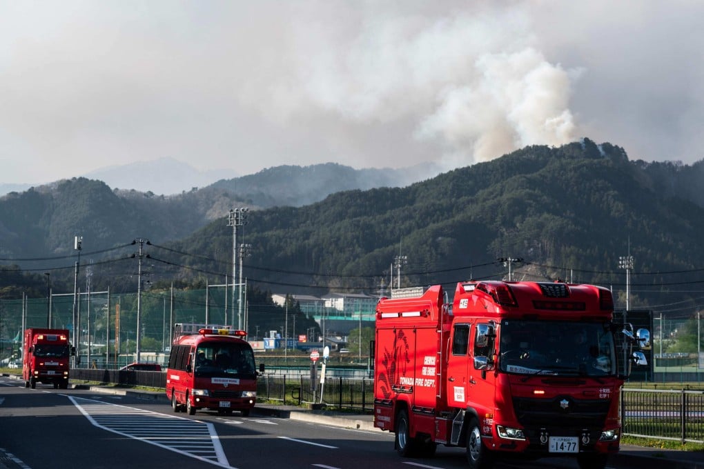 Hundreds of firefighters are battling wildfires in the forests of northern Japan. Photo: AFP