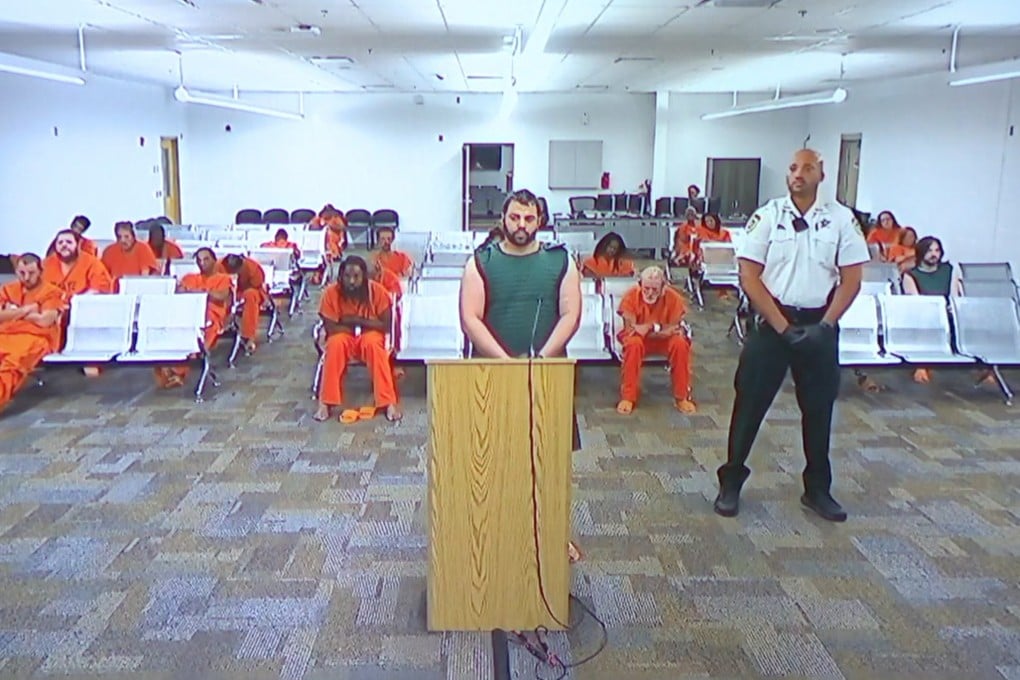 Hisham Abugharbieh, facing two counts of first-degree murder appears in court via video link on Saturday. Photo: WFTS-TV via AP