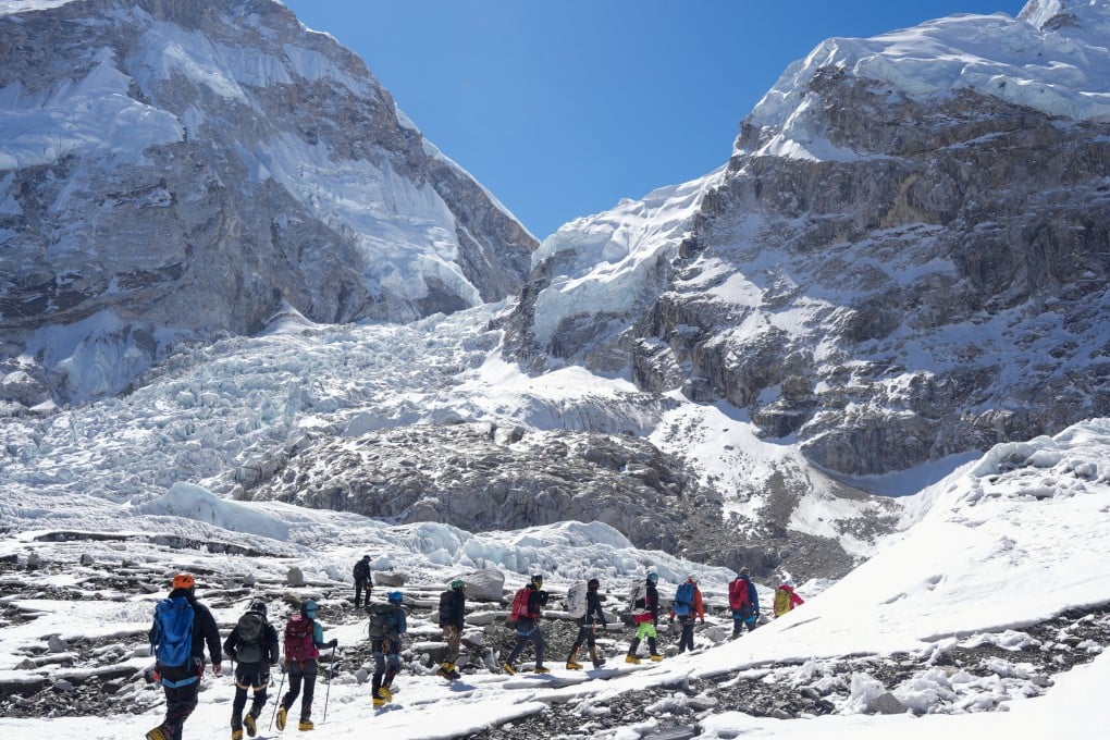 Members of an expedition team hike at Khumbu icefall on Wednesday. Photo: Reuters