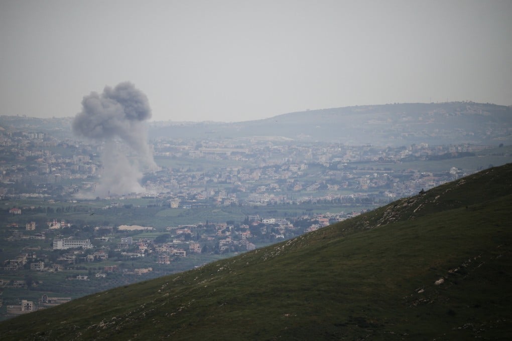 An Israeli strike in southern Lebanon, as seen from northern Israel. Photo: Reuters