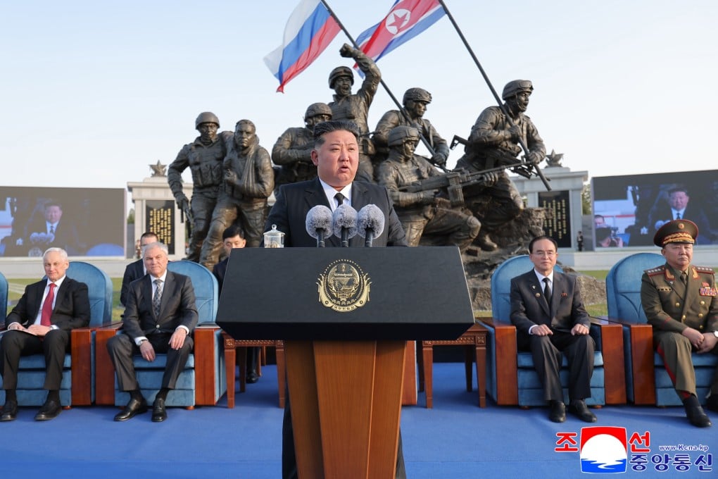 North Korean leader Kim Jong-un delivers a speech in Pyongyang on Sunday as Russian Defence Minister Andrei Belousov (left) and State Duma Speaker Vyacheslav Volodin (second left) listen during a ceremony to launch a museum dedicated to North Korean soldiers who fought in the Ukraine war. Photo: KCNA/EPA