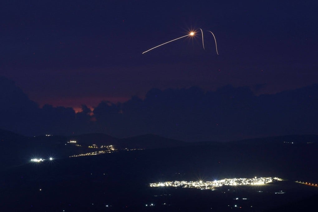 Rockets are intercepted by the Iron Dome over the Upper Galilee region in northern Israel, on April 11. A US news outlet says Israel sent an Iron Dome battery to the UAE early in the Iran war. Photo: AFP