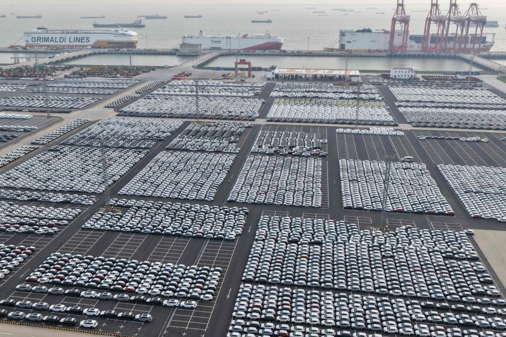 Chinese-made cars wait to be transshipped for export at a port in Suzhou, Jiangsu province, on Monday. Photo: AFP