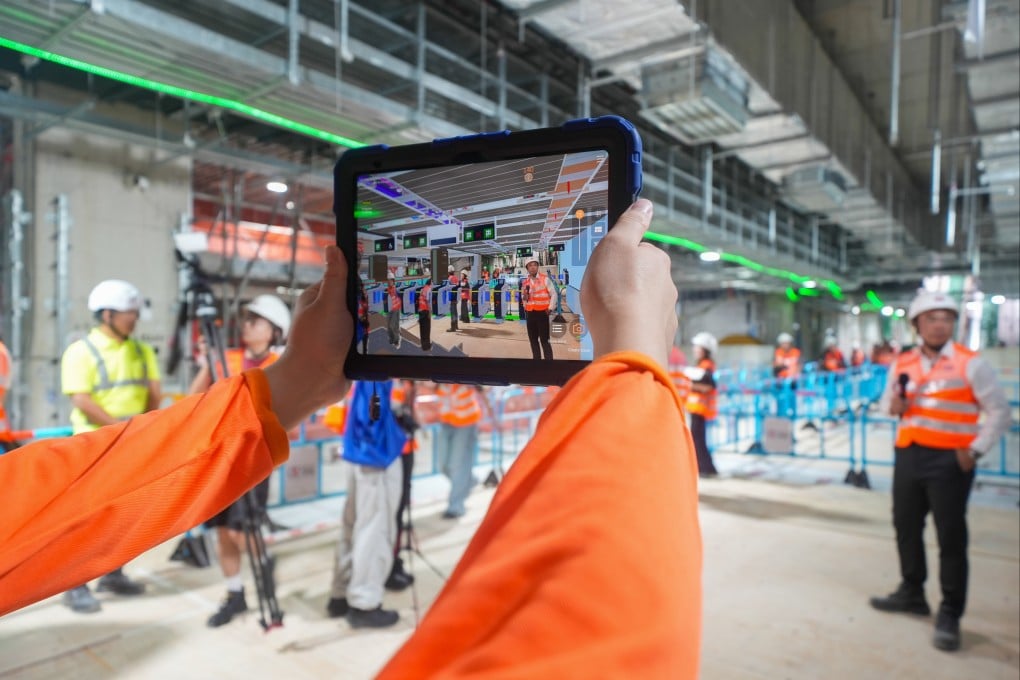 Augmented reality technology allows workers to see how the completed station will look. Photo: Eugene Lee