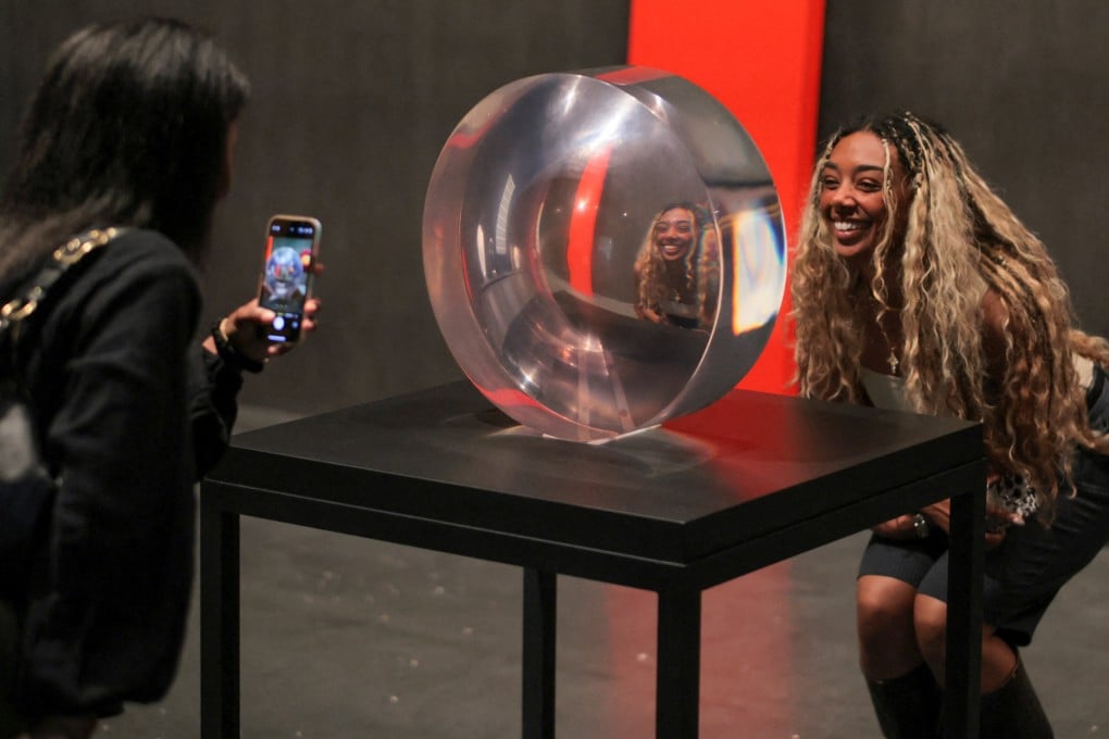 Visitors take pictures at the new David Geffen Galleries, designed by Swiss architect Peter Zumthor, at the Los Angeles County Museum of Art in Los Angeles on April 19, 2026. Photo: Reuters
