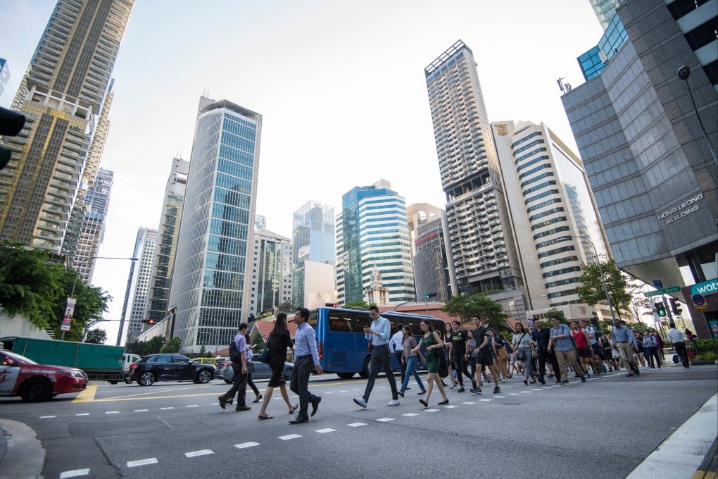 Office workers in Singapore’s Central Business District. Photo: Shutterstock