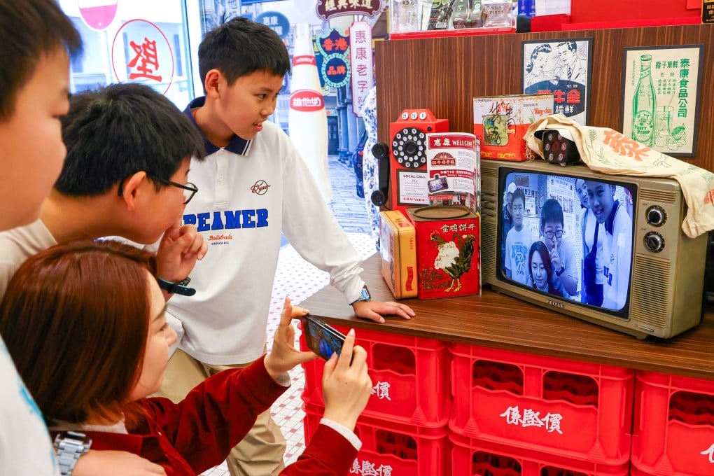 Tourists gather around a retro display at a supermarket near the old Yau Ma Tei police station on February 22. Photo: Dickson Lee
