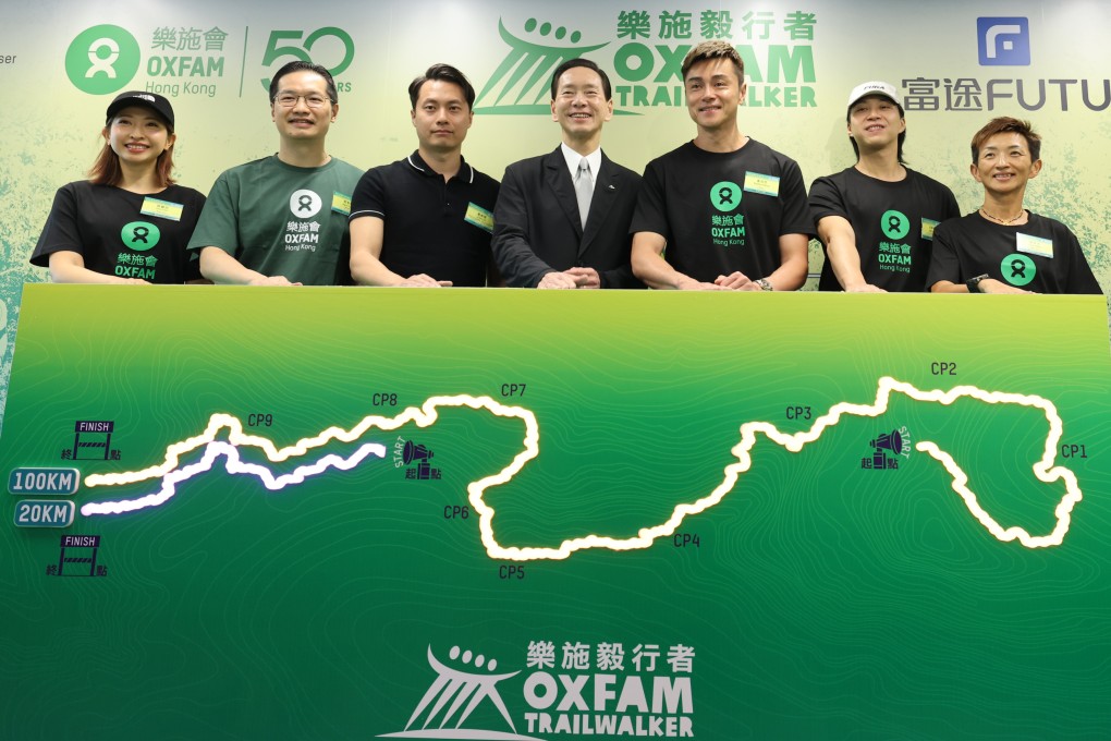 Henry Tang, director general of Oxfam Hong Kong (second from left) and Bernard Chan, Oxfam Trailwalker steering group convenor (fourth from left) at the event press conference on Wednesday. Photo: Nora Tam
