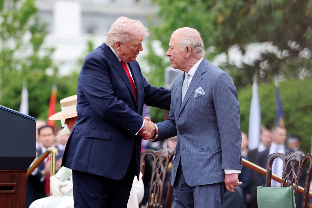 US President Donald Trump (left) and Britan’s King Charles shake hands during the State Arrival Ceremony on the South Lawn on Tuesday. Photo: Reuters