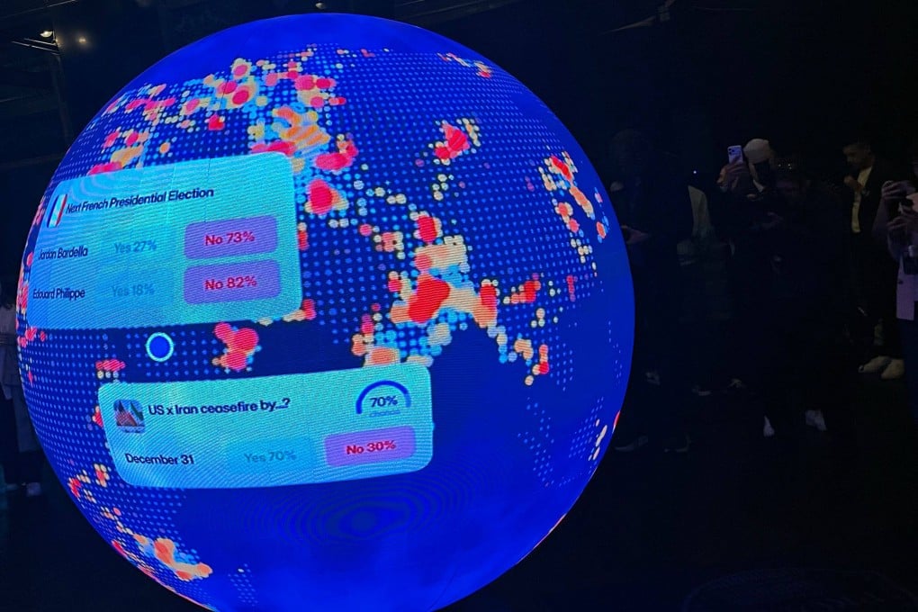 A LED sphere screen shows information at 
“The Situation Room”, a pop-up bar by prediction market platform Polymarket, in Washington on March 20. Photo: AFP