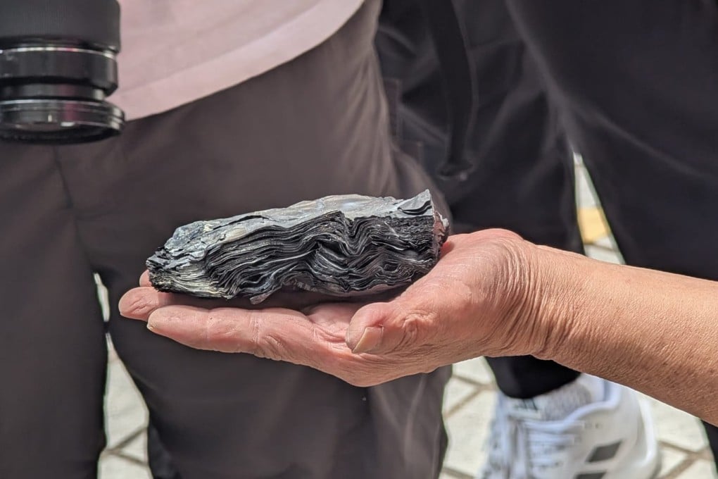 Several residents have found charred banknotes after searching their flats at the fire-ravaged estate. Photo: Kristen Cheung