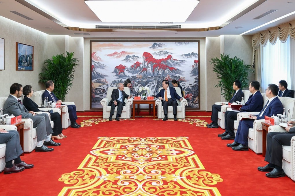 Top Beijing official Xia Baolong (centre right) meets CLP Holdings chairman Michael Kadoorie (centre left). Photo: Handout