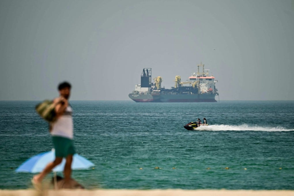 A commercial vessel is seen off the coast of Dubai on April 20. Photo: AFP