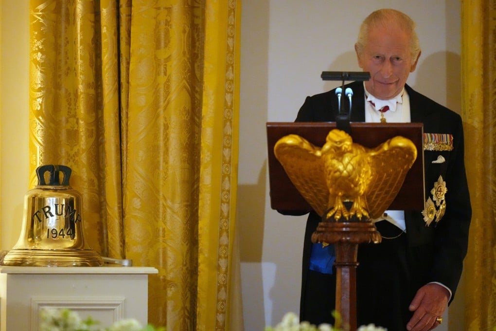 King Charles gives a state dinner speech at the White House on Tuesday, with a ship’s bell bearing the inscription “Trump 1944” to his right. Photo: AP