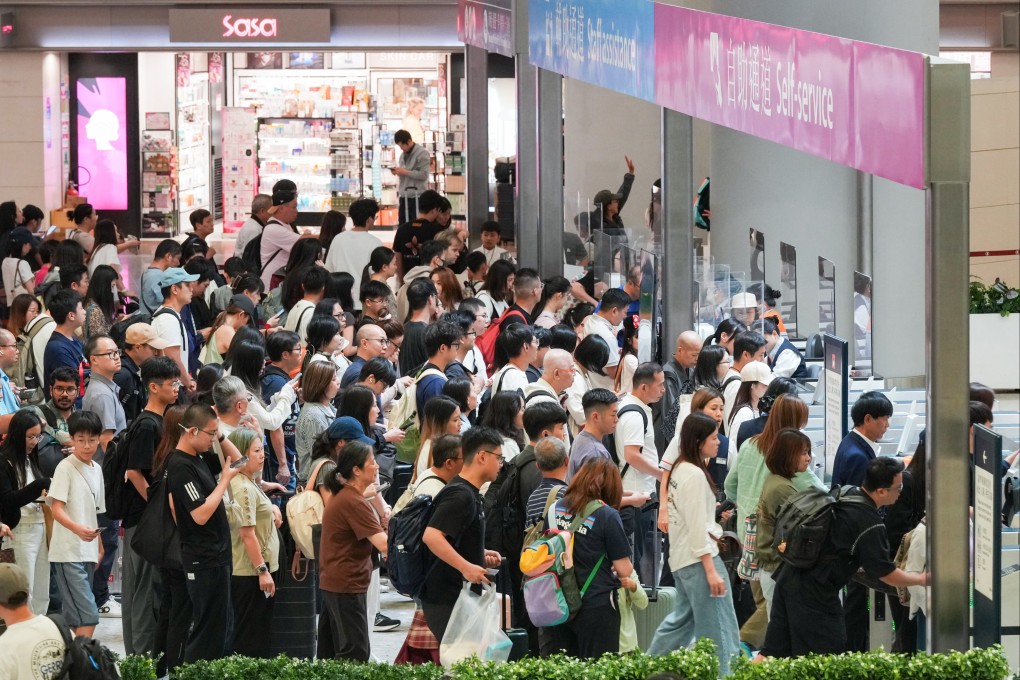 Hong Kong residents pack through border crossings at West Kowloon Stationon on Labour Day as they head over the border to Shenzhen. Photo: Jelly Tse
