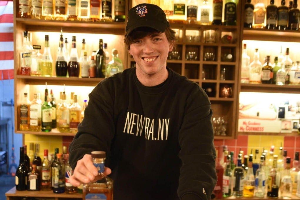 Brendan Kelly stands behind the bar at Kelly’s Pub in Seoul’s Nonwon district. The Irish-American expat shares how his bar attracts locals and “foreigners from all over the world” as the face of the neighbourhood changes. Photo: Korea Times