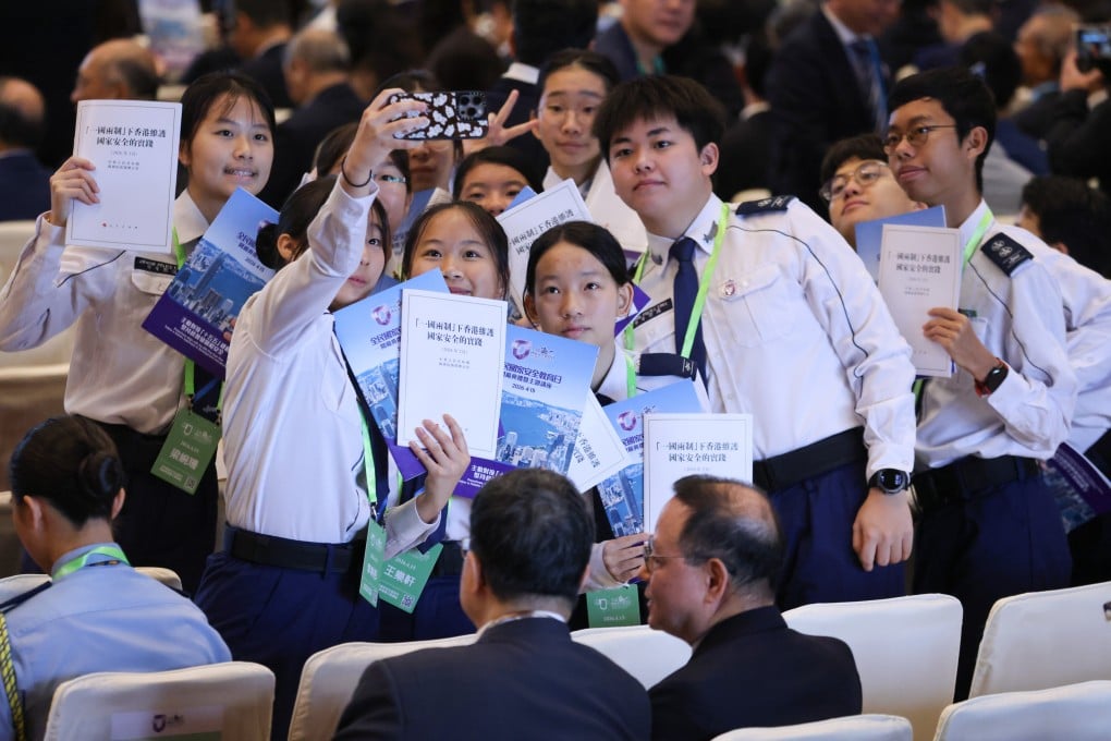 Students attend the opening ceremony of the National Security Education Day held at the Convention and Exhibition Centre in Wan Chai on April 15. Photo: Nora Tam