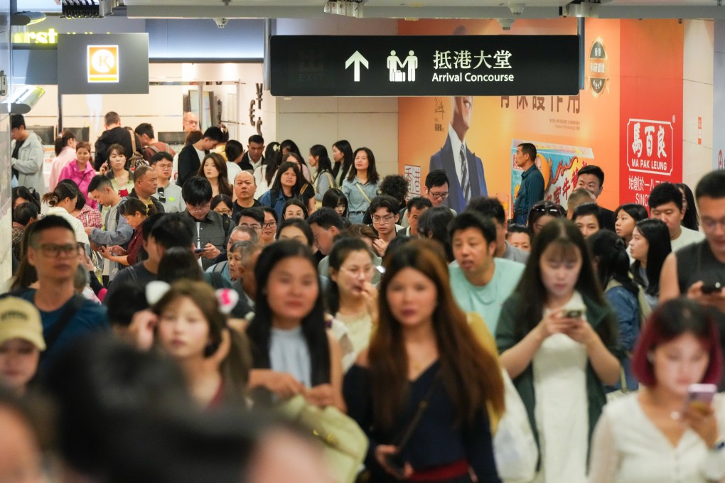 Some early arrivals headed straight to the countryside after getting off at the West Kowloon rail terminus on Friday morning. Photo: Jelly Tse