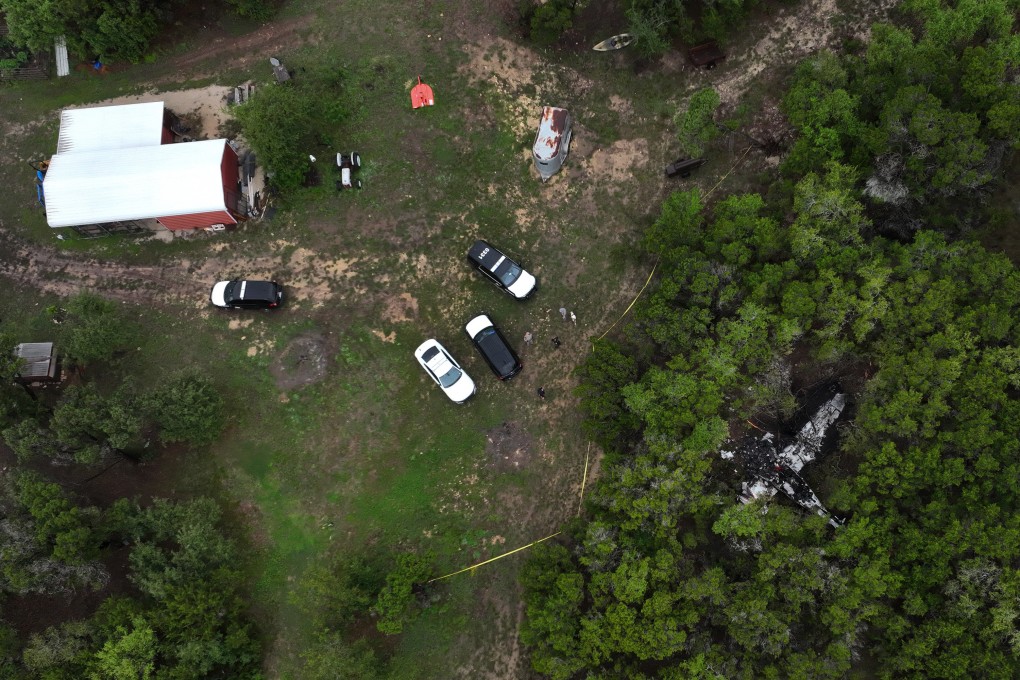 A crashed Cessna airplane in a wooded area on Round Rock Road in Wimberley, Texas on Friday. Photo: via AP