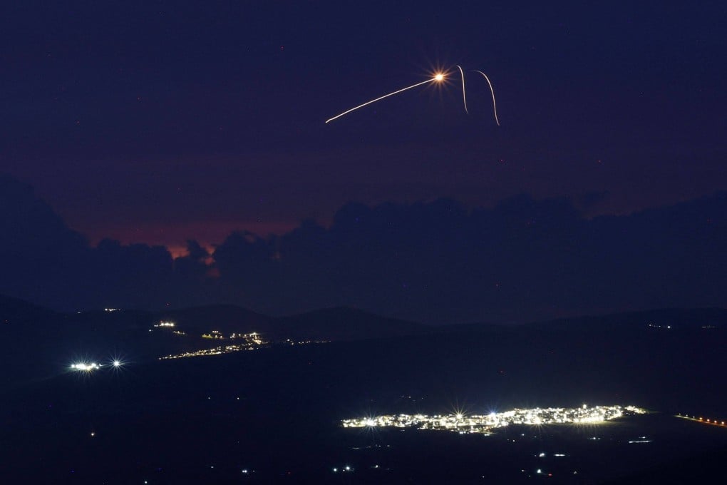 Rockets fired from southern Lebanon intercepted by Israel’s Iron Dome air defence system over the Upper Galilee region on April 11. Photo: AFP