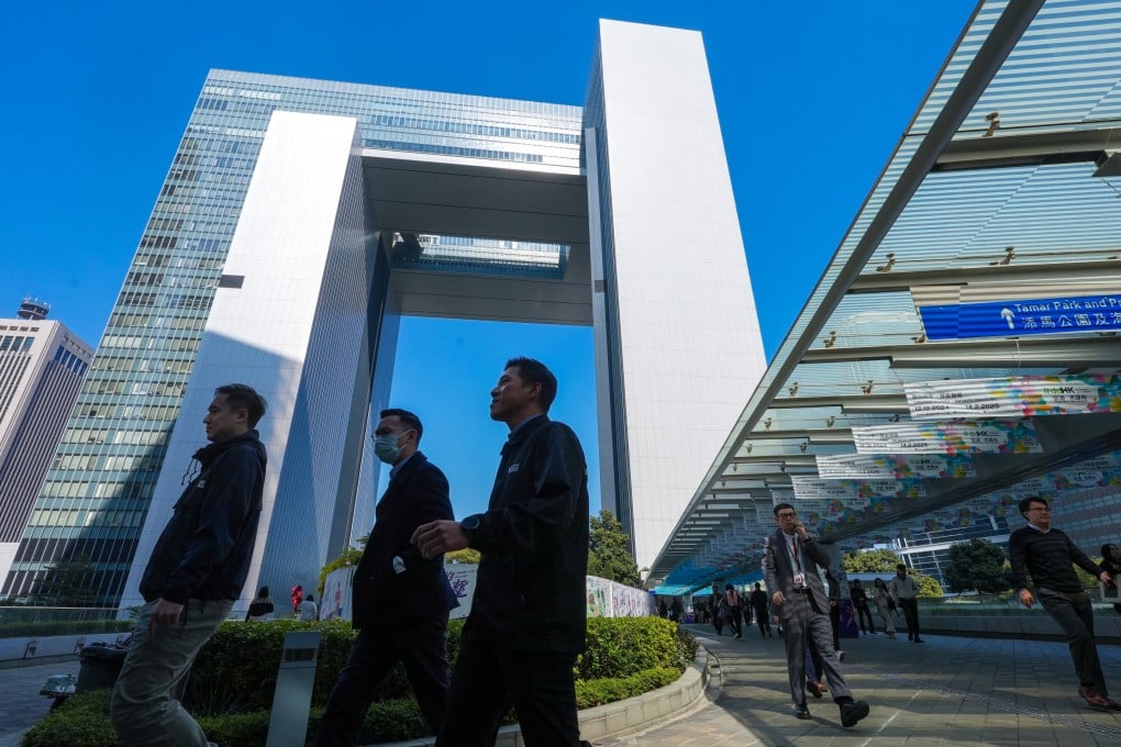 Civil servants leave the Central Government Offices in Tamar during lunchtime. Photo: Sun Yeung