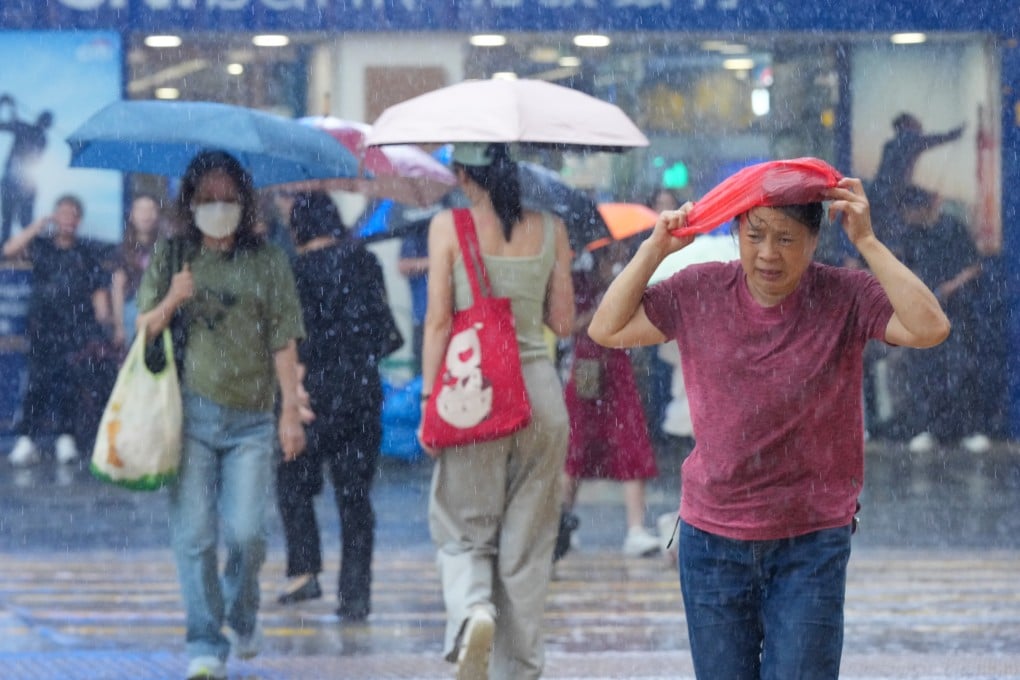 The amber signal was issued at 2.20pm, indicating heavy rain exceeding 30mm per hour had fallen or was expected to persist. Photo: Jelly Tse