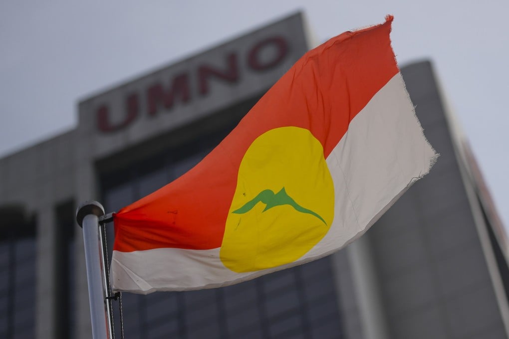 A United Malays National Organisation (UMNO) flag waves outside the party headquarters in Kuala Lumpur, Malaysia. Photo: EPA-EFE