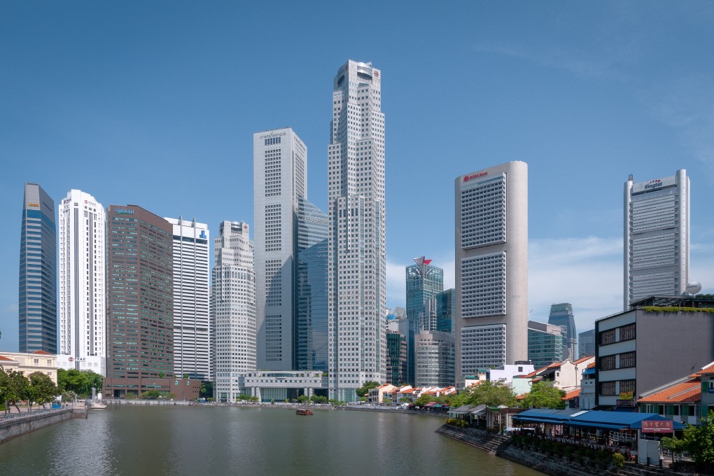 Skyline of Boat Quay with prominent bank buildings in Singapore’s financial district, featuring OCBC, UOB, and Raffles Place. On Monday, OCBC announced its decision to take over HSBC’s retail and wealth management in Indonesia. Photo: Shutterstock