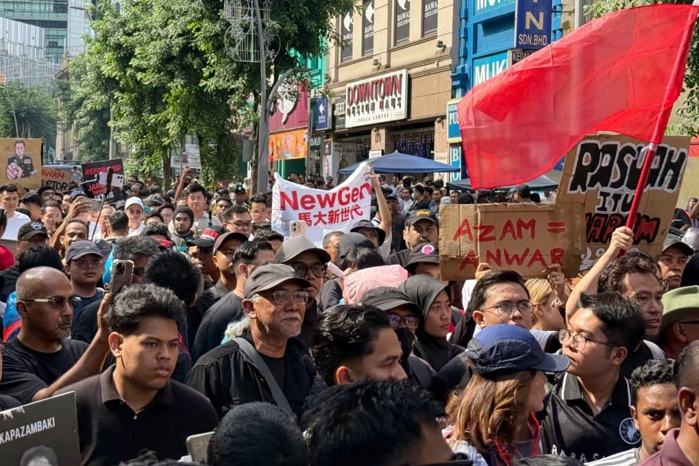 Around 200 protesters march through central Kuala Lumpur to rally against MACC chief Azam Baki on April 25. Photo: Iman Muttaqin Yusof