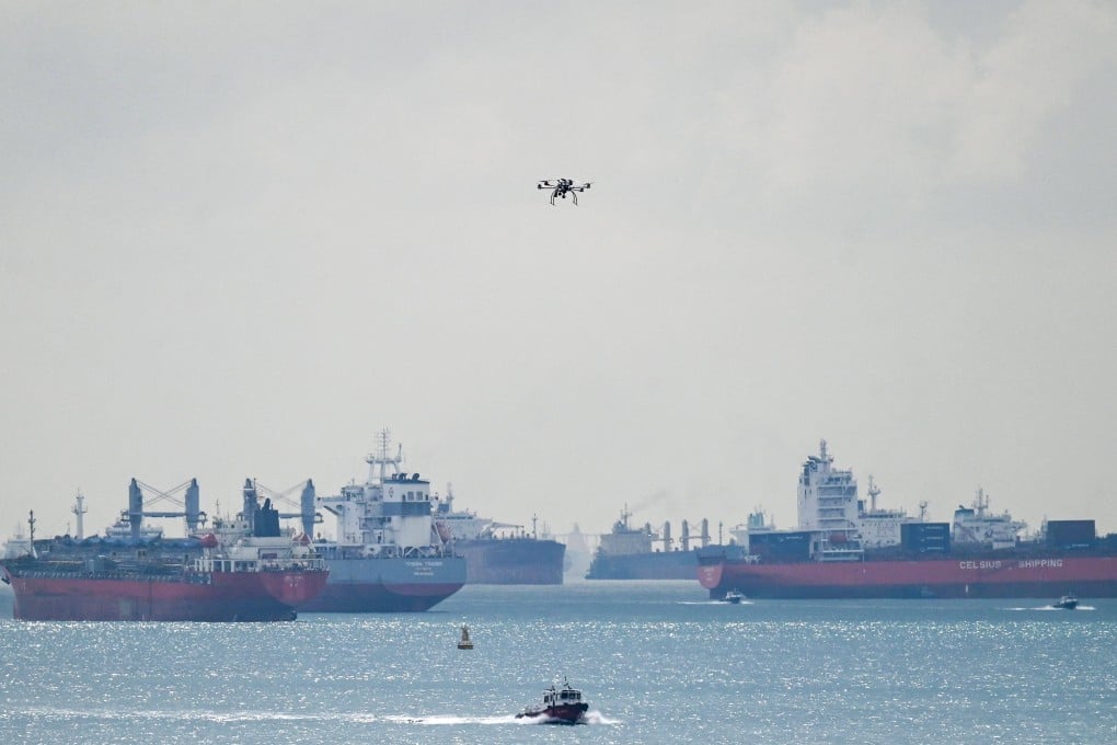 Vessels are seen at anchor in the Singapore Strait as a drone flies on April 21. Photo: AFP