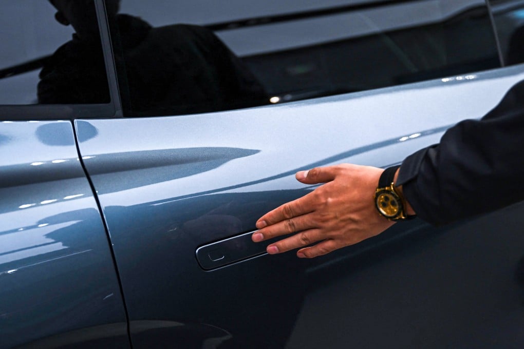 A Zeekr X7 electric vehicle with a flush door handle is on display at a showroom in Beijing. Photo: AFP
