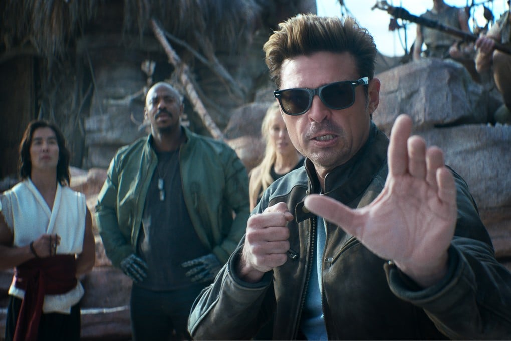 (From left) Ludi Lin as Liu Kang, Mehcad Brooks as Jackson “Jax” Briggs, Jessica McNamee as Sonya Blade and Karl Urban as Johnny Cage in a still from Mortal Kombat II (category III), directed by Simon McQuoid. Photo: Warner Bros