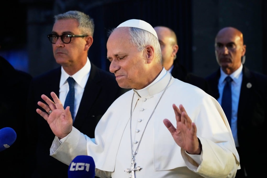 Pope Leo speaks to journalists as he leaves his residence in Castel Gandolfo, on the outskirts of Rome, on Tuesday. Photo: AP