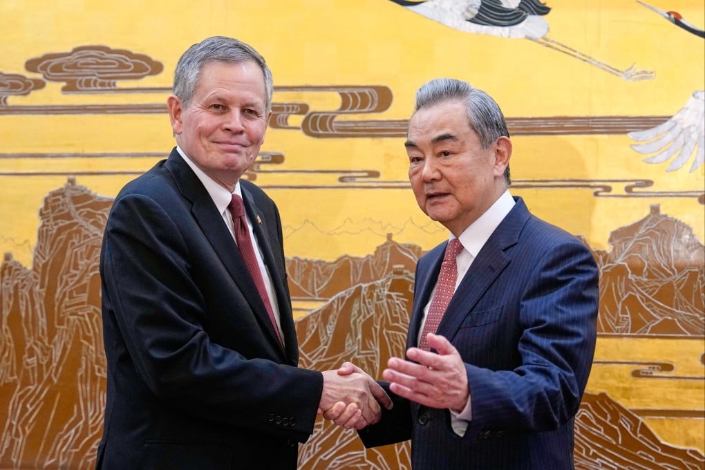 US Senator Steve Daines is greeted by Chinese Foreign Minister Wang Yi at the Great Hall of the People in Beijing on Thursday. Photo: AP