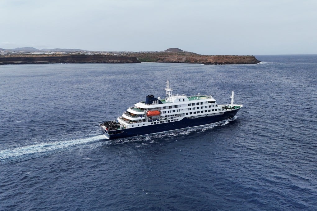 The hantavirus-stricken cruise ship MV Hondius leaves Praia, Cape Verde, on Wednesday. Photo: Reuters