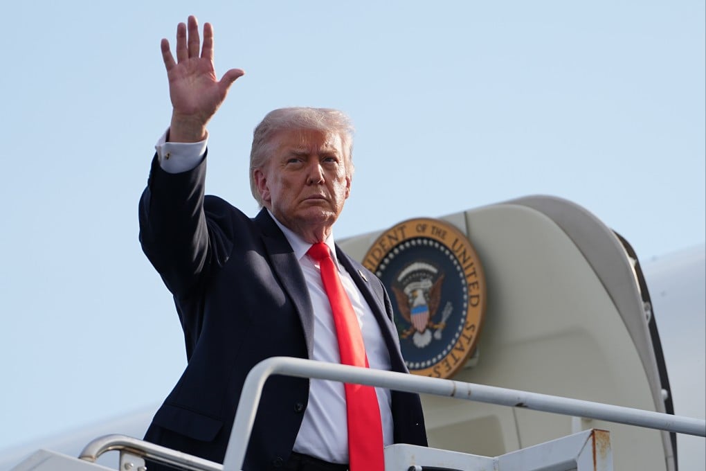 US President Donald Trump boards Air Force One at Ocala International Airport in Florida on Friday. Photo: AP