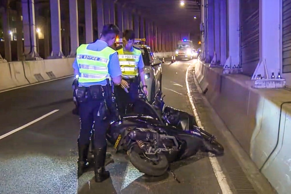 A motorcyclist has died after reportedly losing control of his vehicle and overturning inside the Eastern Harbour Crossing. Photo: Now TV News