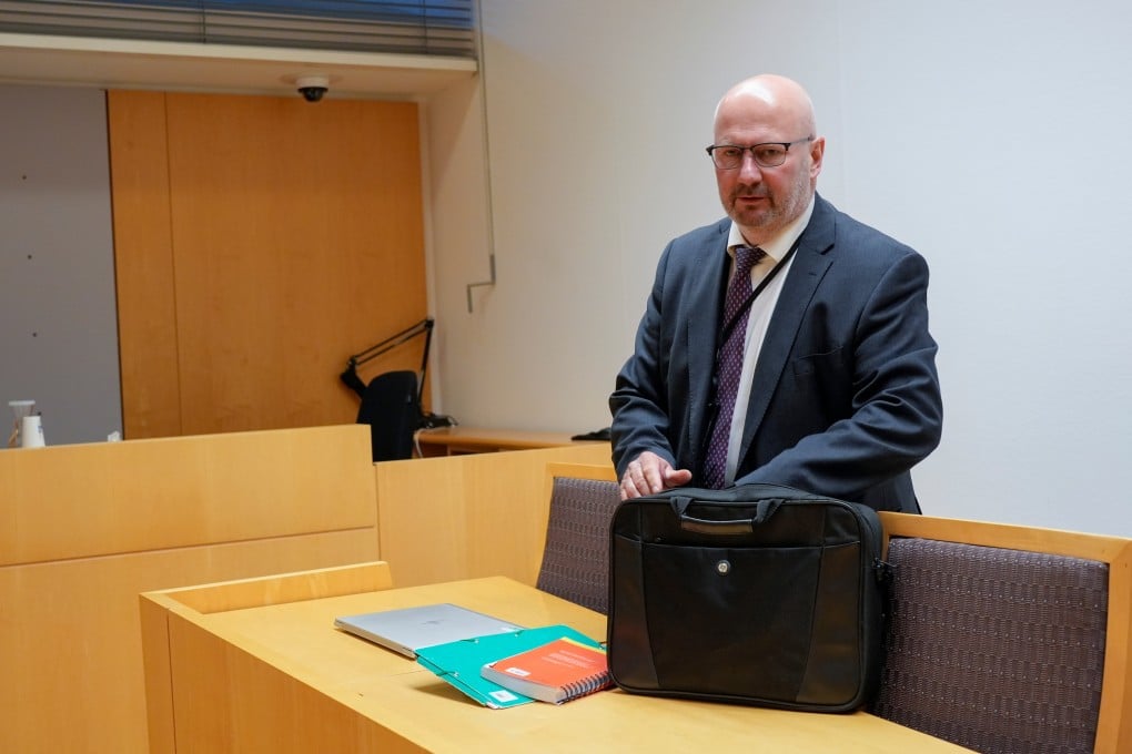 Police prosecutor Thomas Blom arrives in court before the detention hearing for a woman suspected of spying for China, in Oslo, Norway on Tuesday. Photo: NTB Scanpix via AP