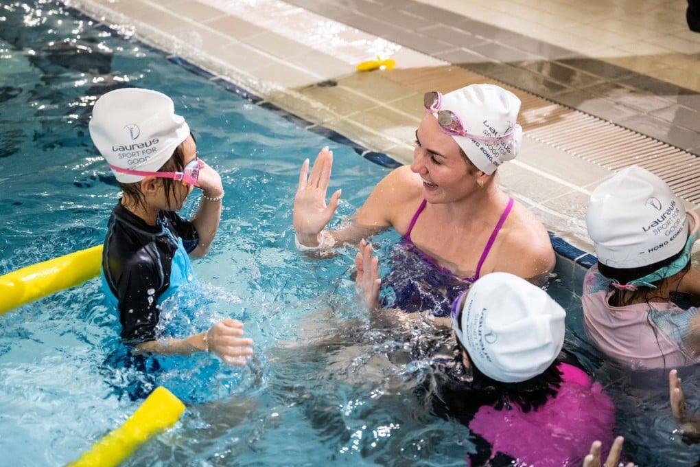 Ariarne Titmus having fun during a Laureus visit to Renaissance College in Ma On Shan. Photo: Laureus