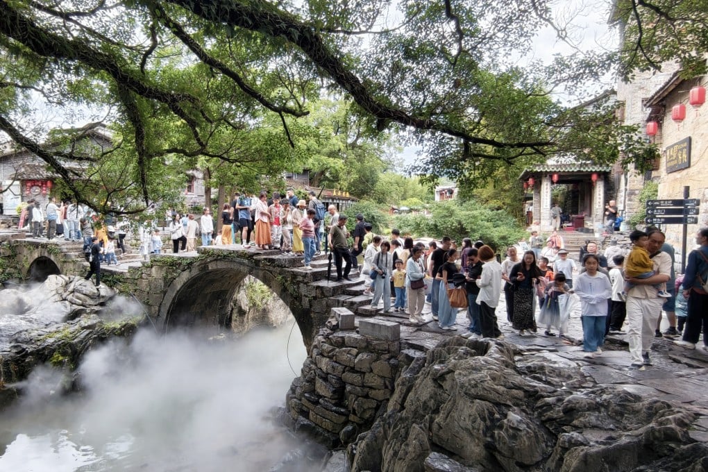 Tourists visit the Huangyao ancient town in Zhaoping county, Guangxi Zhuang autonomous region, on May 3. Photo: Xinhua